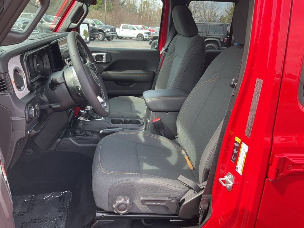 Used 2025 Jeep Wrangler 4xe Sahara 4XE with VIN 1C4RJXP63SW586037 for sale in Merrill, WI