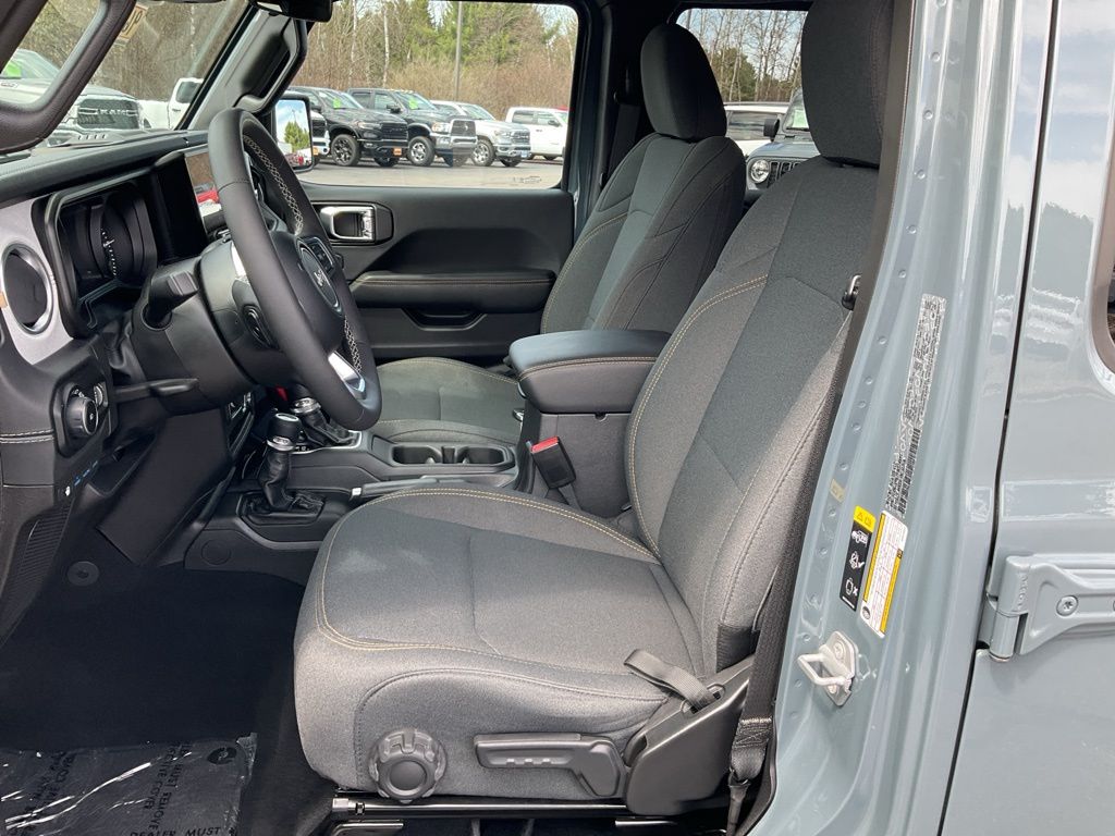 Used 2025 Jeep Wrangler 4xe Sahara 4XE with VIN 1C4RJXP61SW579331 for sale in Merrill, WI