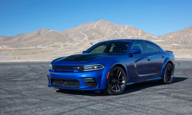 2020 Dodge Challenger exterior in blue parked along mountain view