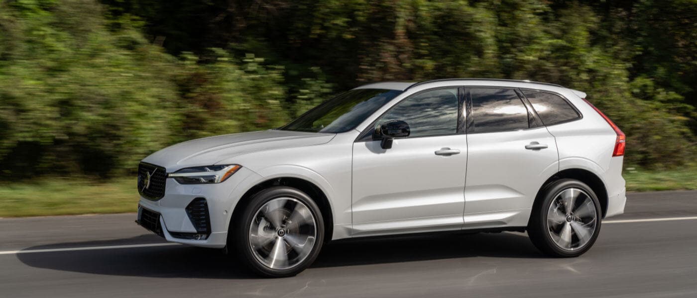 2022 Volvo XC60 side exterior driving down the road