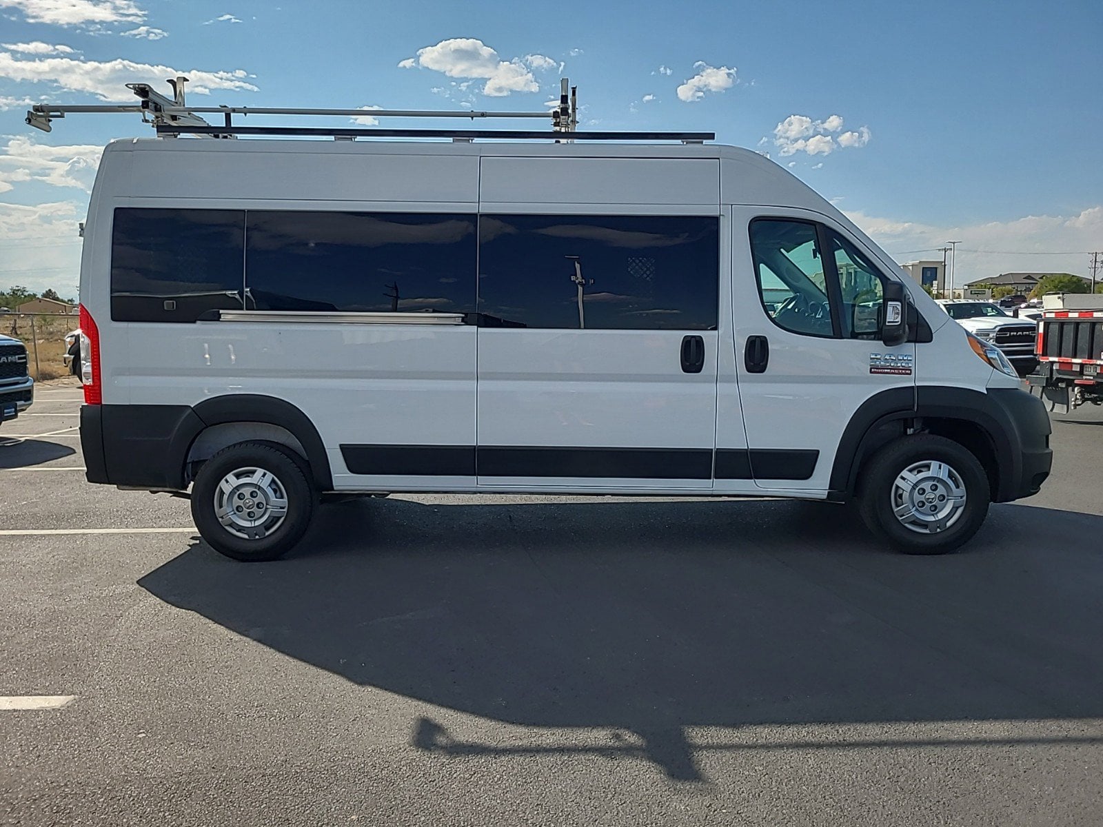 Used 2022 RAM ProMaster Window Van Base with VIN 3C6LRVPG5NE125701 for sale in Brighton, CO