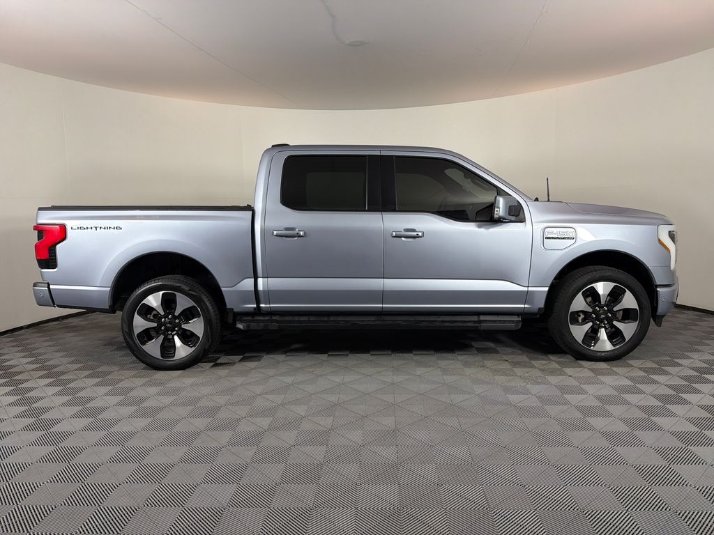 Used 2022 Ford F-150 Lightning Platinum with VIN 1FT6W1EV1NWG03272 for sale in Brighton, CO
