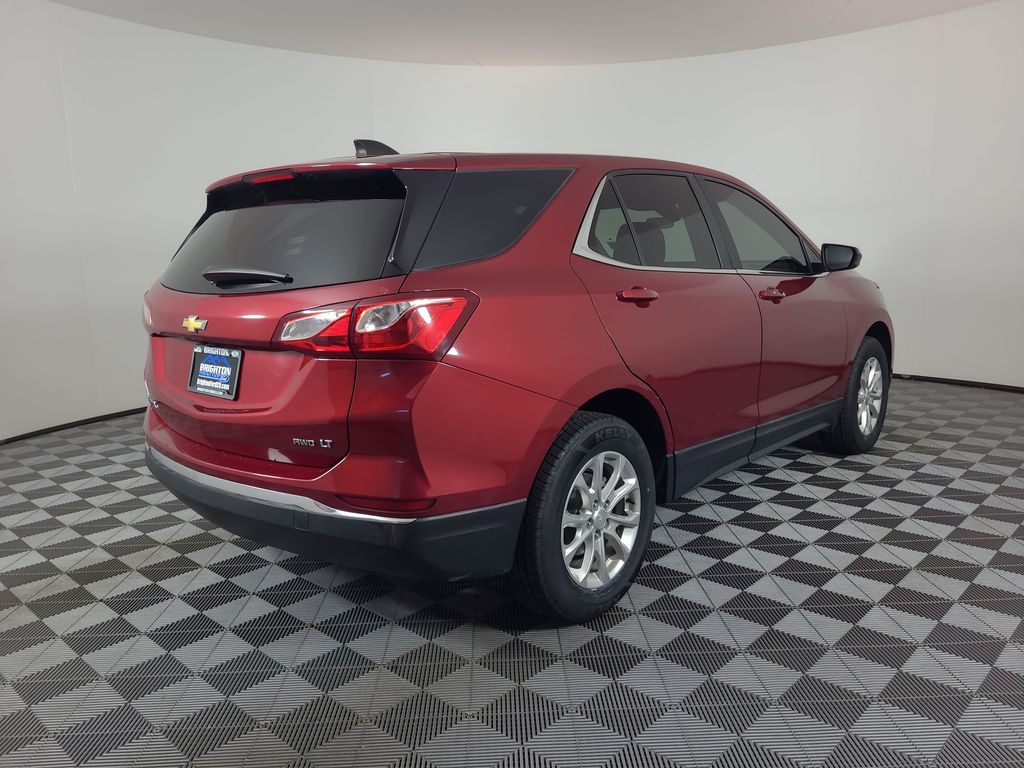 Used 2021 Chevrolet Equinox LT with VIN 2GNAXUEV1M6106490 for sale in Brighton, CO
