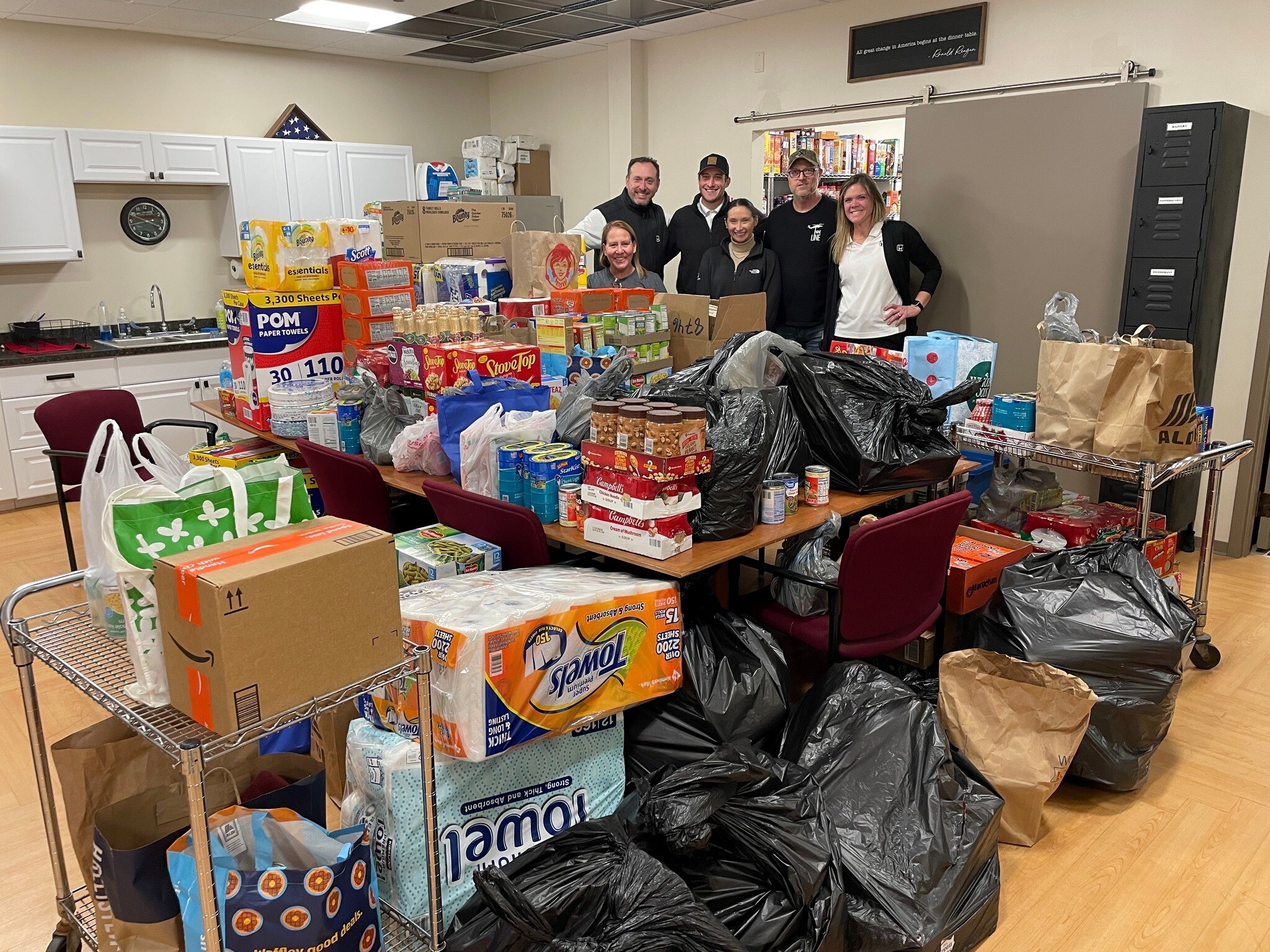 Veterans Path to Hope Donations Brilliance employees stand behind the over 1,000 different items they donated to Veterans Path to Hope
