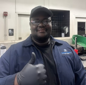 Staff member David Afolabi from a67ada6b4f55
