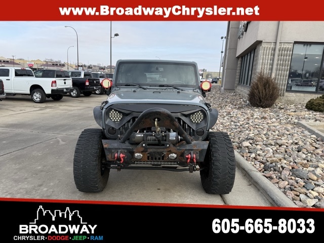 Used 2014 Jeep Wrangler Unlimited Sahara with VIN 1C4BJWEG5EL135902 for sale in Yankton, SD