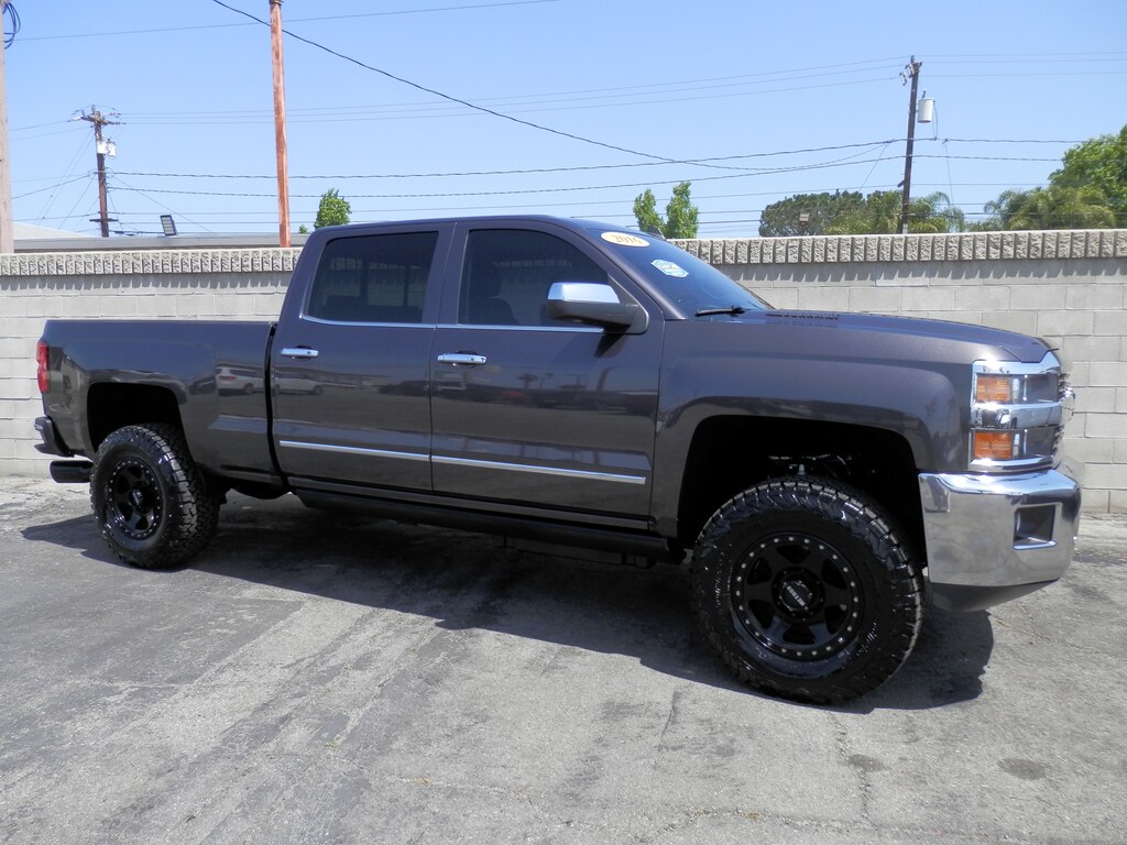 Used 2016 Chevrolet Silverado 2500HD LTZ (6.6 TURBO DSL) (4WD) (4 INCH CST CUSTOM LIFT) Truck Crew Cab