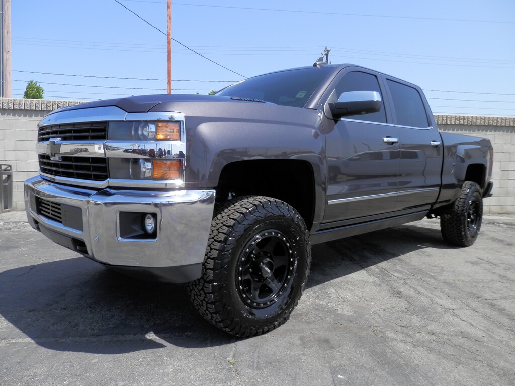 Used 2016 Chevrolet Silverado 2500HD LTZ (6.6 TURBO DSL) (4WD) (4 INCH CST CUSTOM LIFT) Truck Crew Cab
