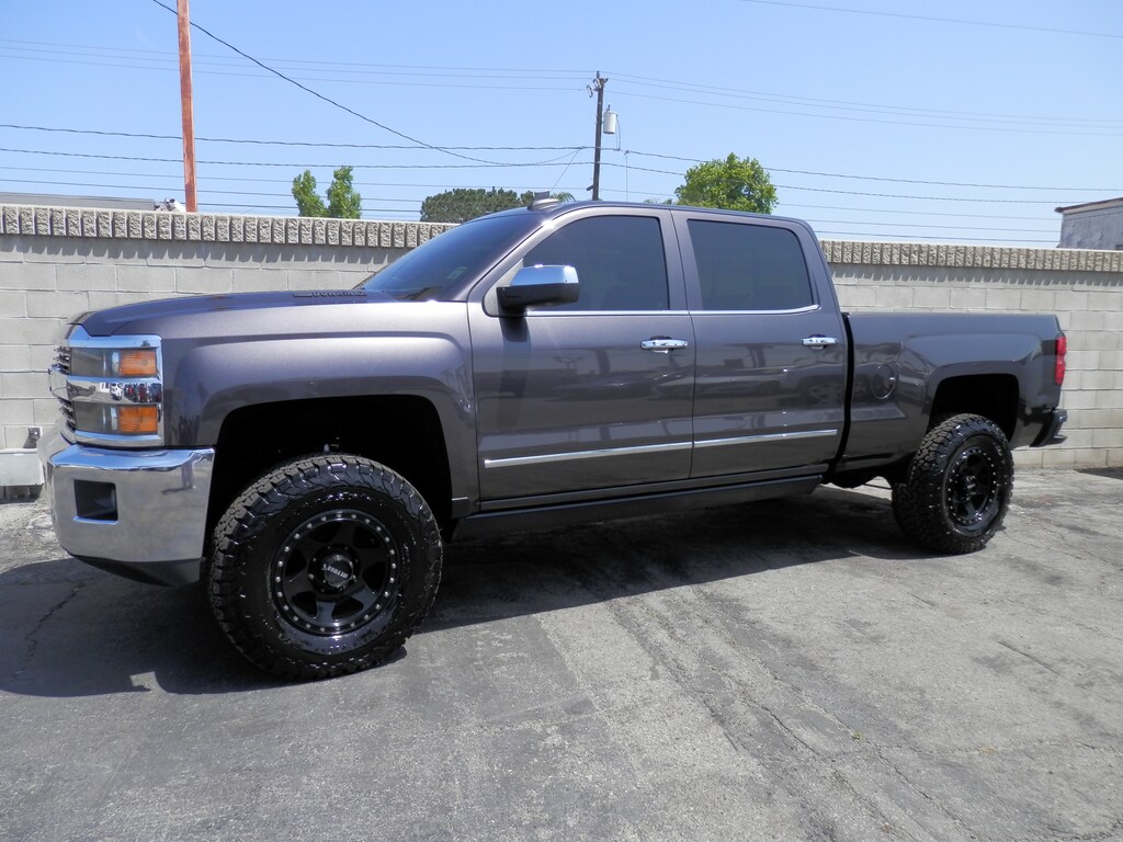 Used 2016 Chevrolet Silverado 2500HD LTZ (6.6 TURBO DSL) (4WD) (4 INCH CST CUSTOM LIFT) Truck Crew Cab
