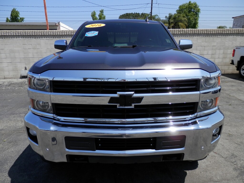 Used 2016 Chevrolet Silverado 2500HD LTZ (6.6 TURBO DSL) (4WD) (4 INCH CST CUSTOM LIFT) Truck Crew Cab
