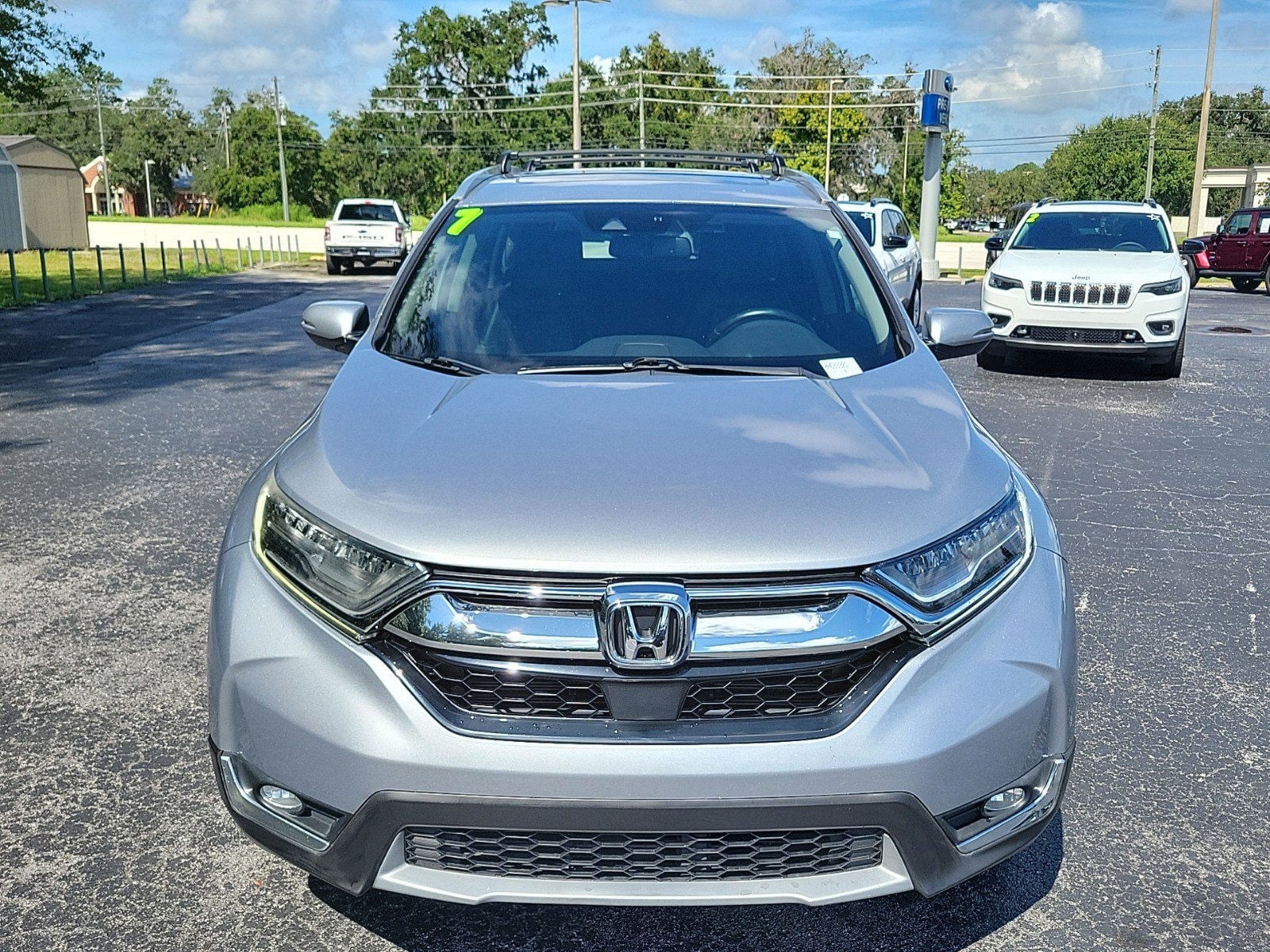 Used 2017 Honda CR-V Touring with VIN 2HKRW2H91HH633321 for sale in Brooksville, FL