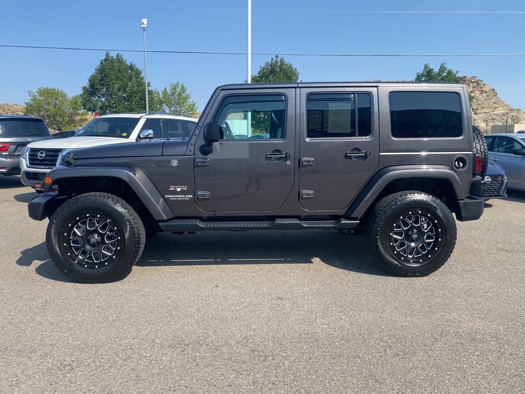 Used 2016 Jeep Wrangler Unlimited Sahara with VIN 1C4HJWEG2GL229538 for sale in Rock Springs, WY