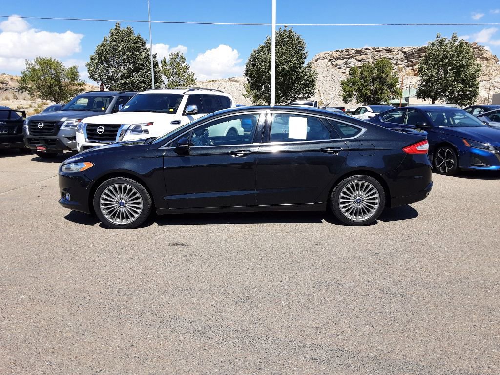 Used 2015 Ford Fusion Titanium with VIN 3FA6P0K98FR282291 for sale in Rock Springs, WY