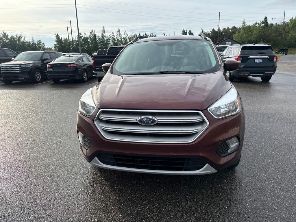 Used 2018 Ford Escape SE with VIN 1FMCU9GD4JUC05468 for sale in Petoskey, MI