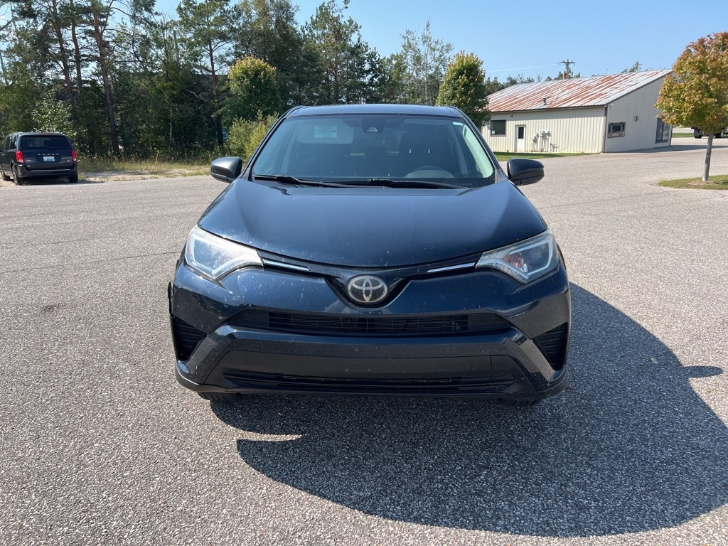 Used 2018 Toyota RAV4 LE with VIN 2T3BFREV8JW779211 for sale in Petoskey, MI