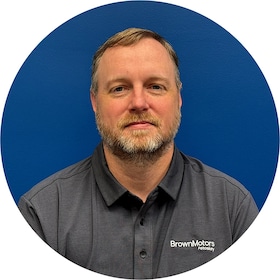 Staff member Tom Clark from ID_b3c0e7