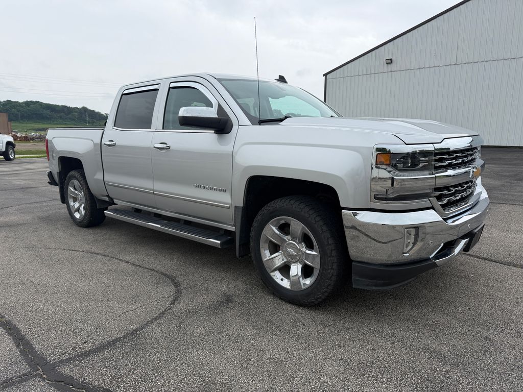 Used 2018 Chevrolet Silverado 1500 LTZ with VIN 3GCUKSEC7JG212336 for sale in Elkader, IA