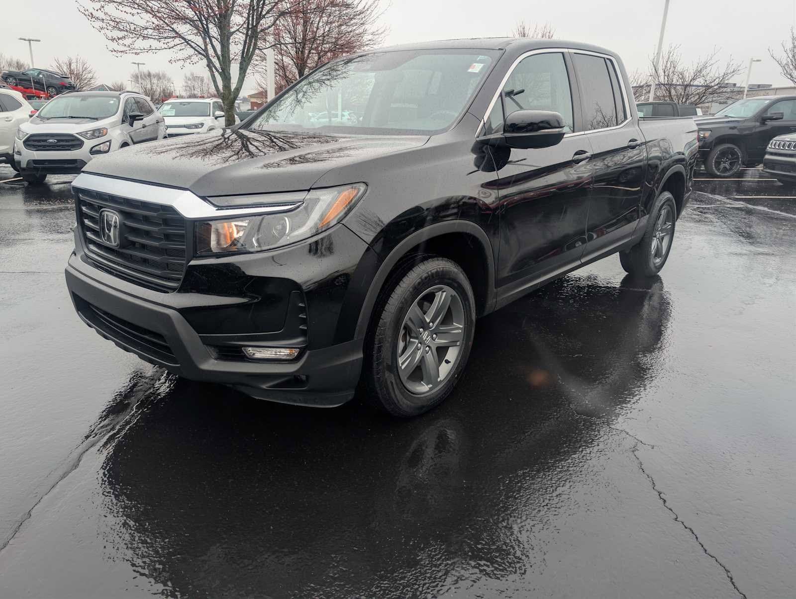 View vehicle photo 3