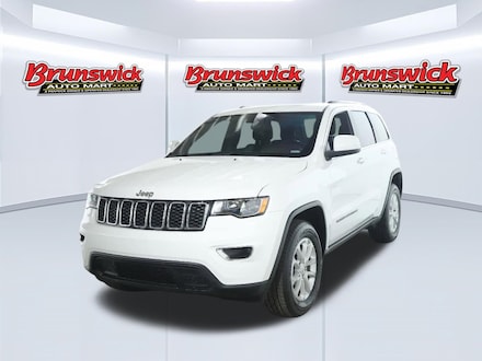 Featured Pre-Owned 2021 Jeep Grand Cherokee Laredo SUV for sale near you in Brunswick, OH