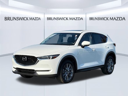 Featured Pre-Owned 2021 Mazda CX-5 Grand Touring SUV for sale near you in Brunswick, OH