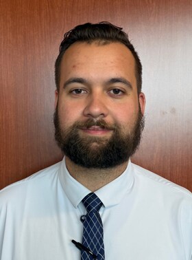 Staff member Patrick Kanieski from 12535646dba3