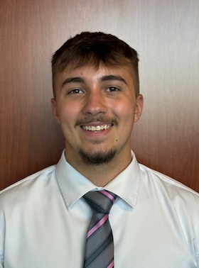 Staff member Zach Tick from 12535646dba3