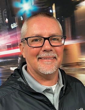 Staff member Joshua Allred from 6681b9f5778d