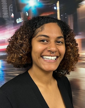 Staff member Kelci Tyler from ca80282c7e9b