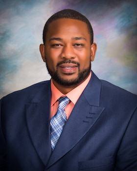 Staff member Ed Grier from 954637926424