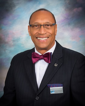 Staff member Romuald Hawthorne from 48cbf28b8b73