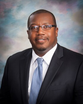 Staff member Lorenzo Faison from 954637926424