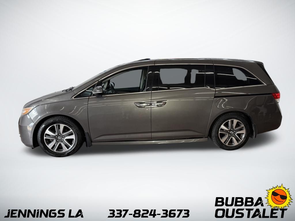 Used 2016 Honda Odyssey Touring with VIN 5FNRL5H94GB132916 for sale in Jennings, LA
