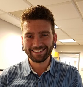 Staff member Adam Baer from ID_417f7f30d08b