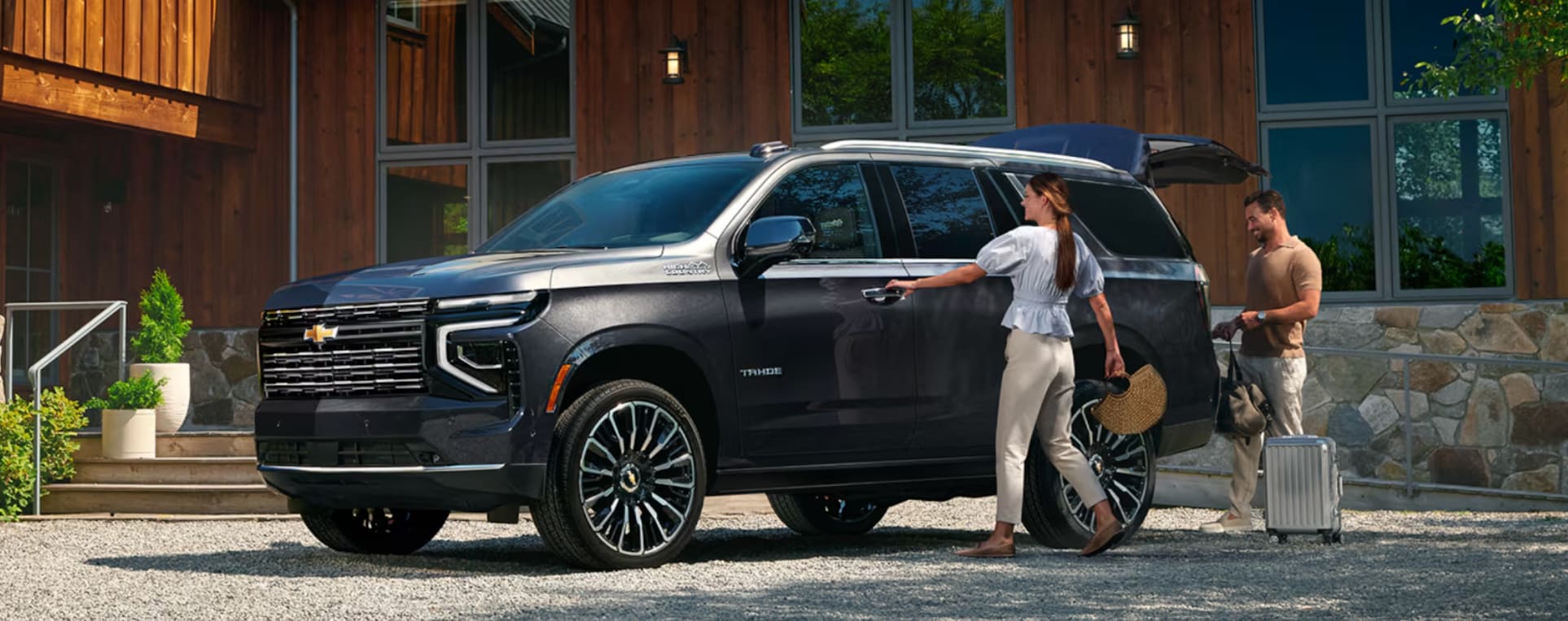 Atlanta couple getting into a Chevy Tahoe SUV from Buddy Chevrolet Atlanta couple getting into a Chevy Tahoe SUV from Buddy Chevrolet