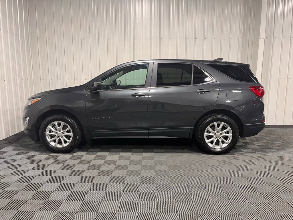 Used 2021 Chevrolet Equinox LT with VIN 2GNAXUEV0M6100390 for sale in Celina, OH