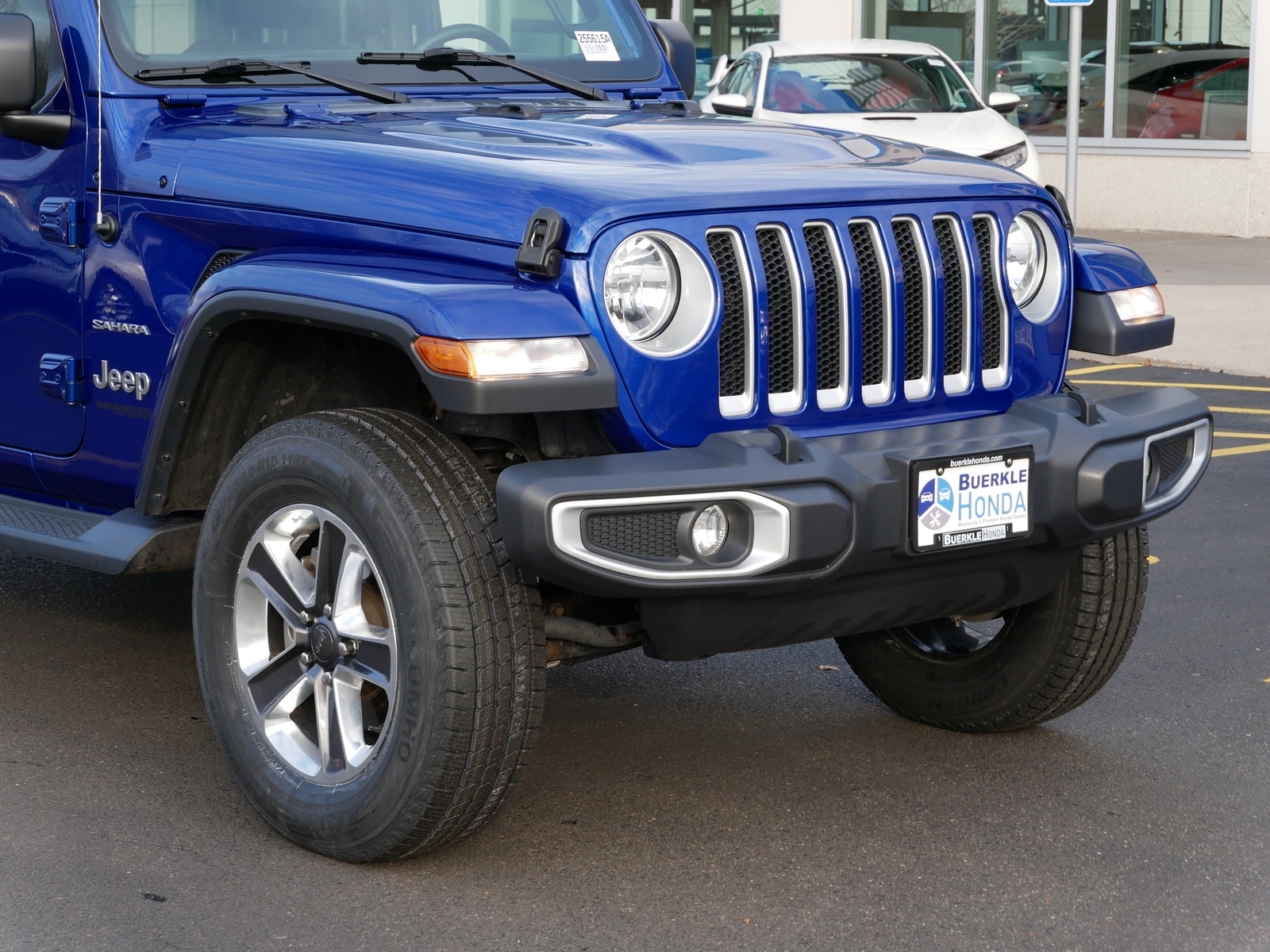 Used 2019 Jeep Wrangler Unlimited Sahara with VIN 1C4HJXEGXKW580291 for sale in Saint Paul, Minnesota