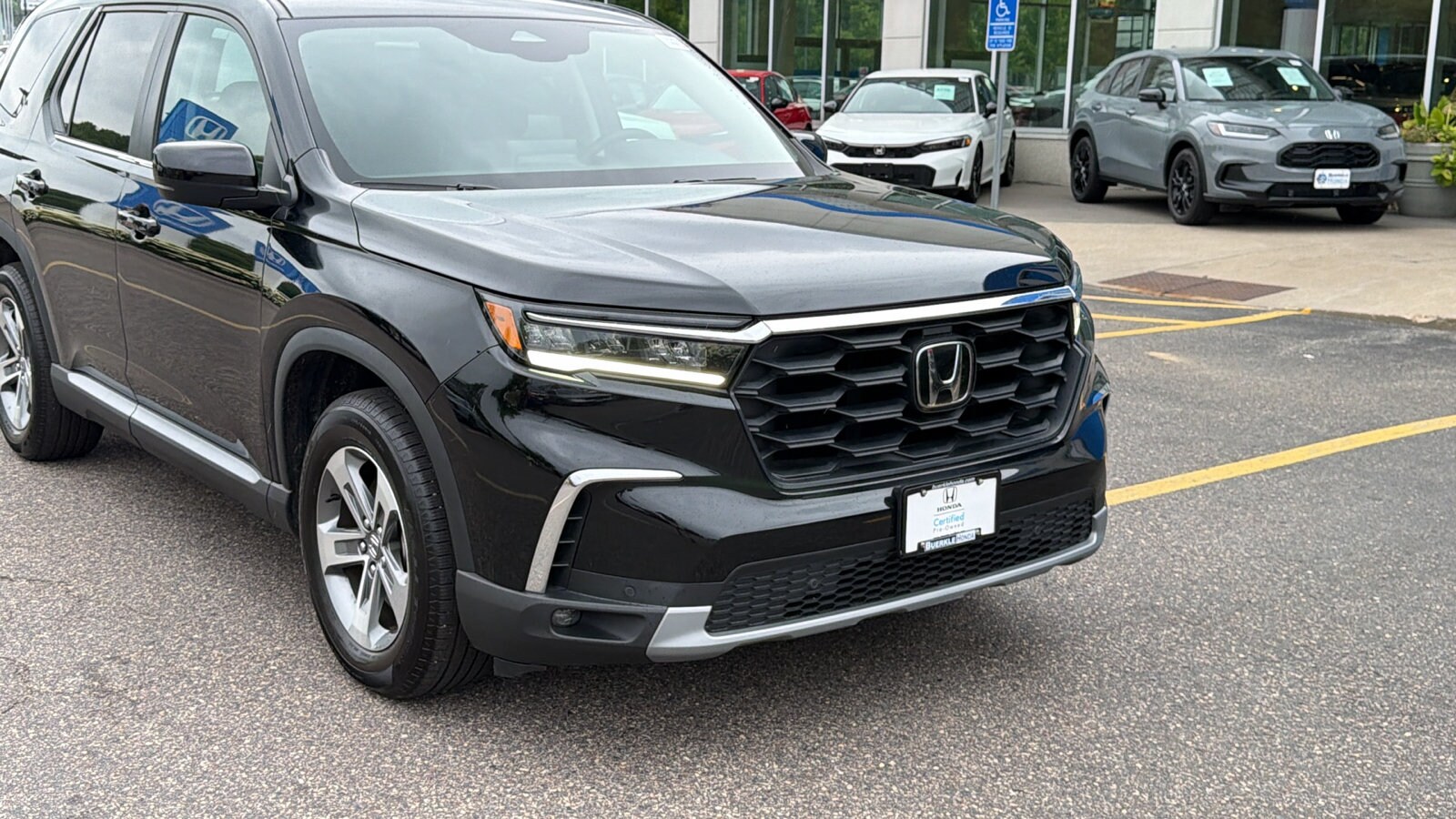 Certified 2023 Honda Pilot EX-L with VIN 5FNYG1H49PB031691 for sale in Saint Paul, Minnesota