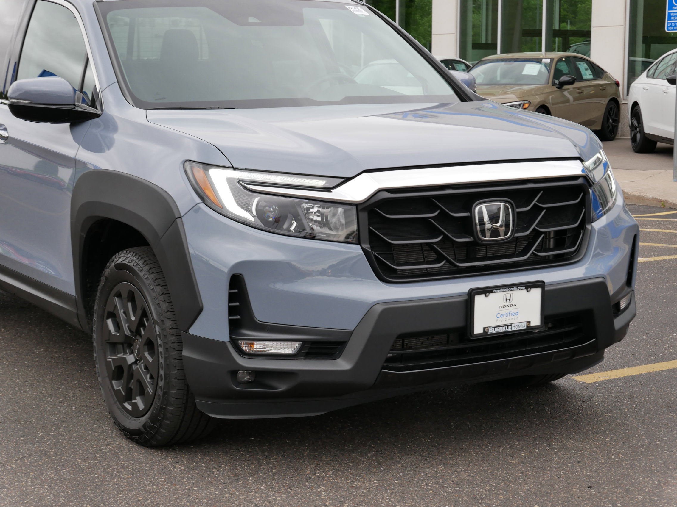 Certified 2023 Honda Ridgeline RTL-E with VIN 5FPYK3F79PB065192 for sale in Saint Paul, Minnesota