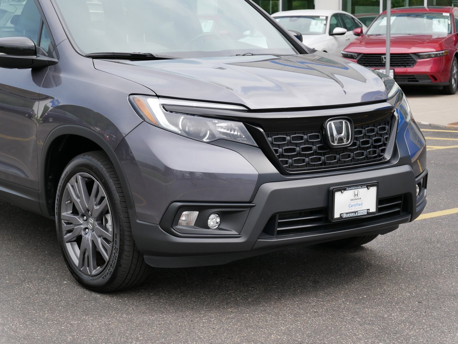 Certified 2021 Honda Passport EX-L with VIN 5FNYF8H50MB034558 for sale in Saint Paul, MN