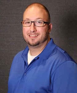 Staff member Adam Thompson from 27f31cd95112