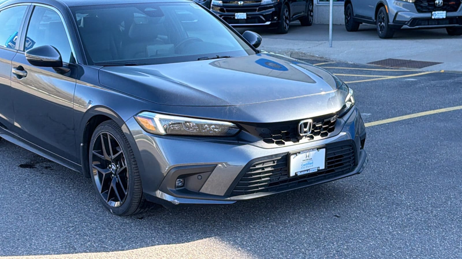 Certified 2023 Honda Civic Hatchback Sport Touring with VIN 19XFL1H80PE009039 for sale in Saint Paul, Minnesota