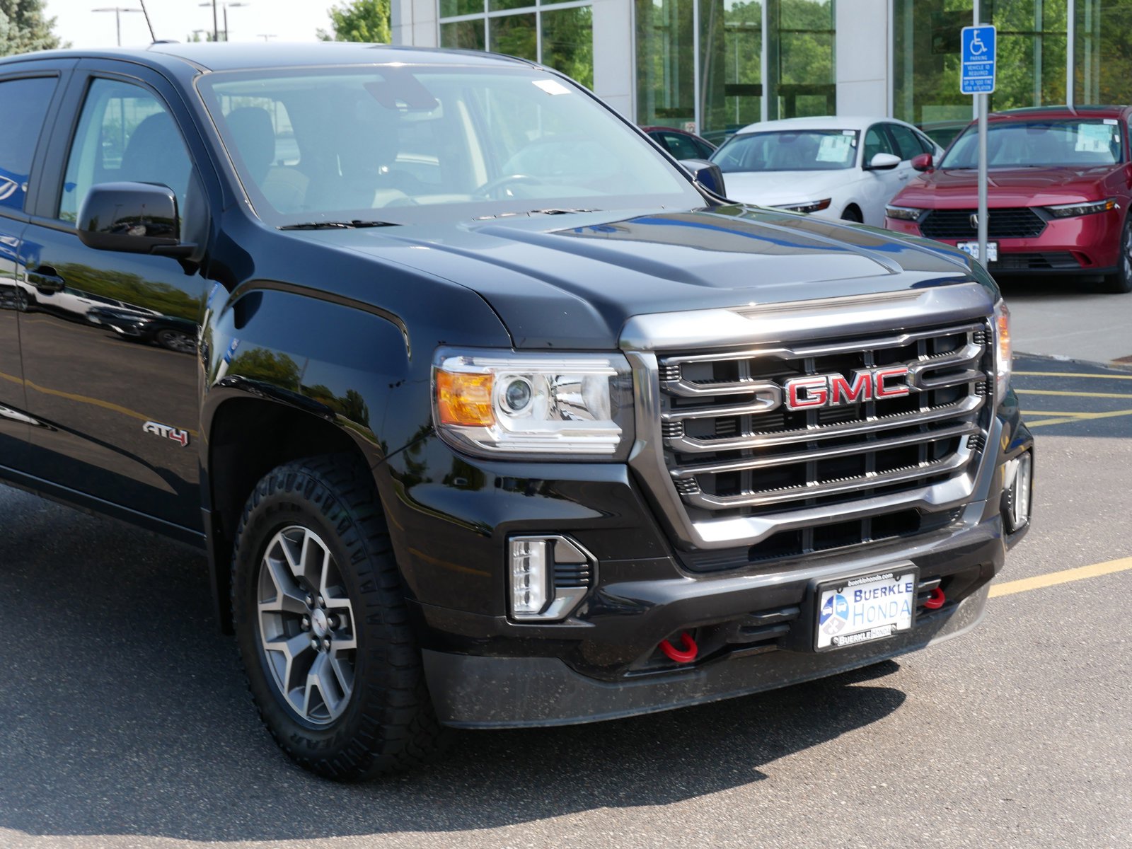 Used 2022 GMC Canyon AT4 with VIN 1GTG6FEN0N1116840 for sale in Saint Paul, MN