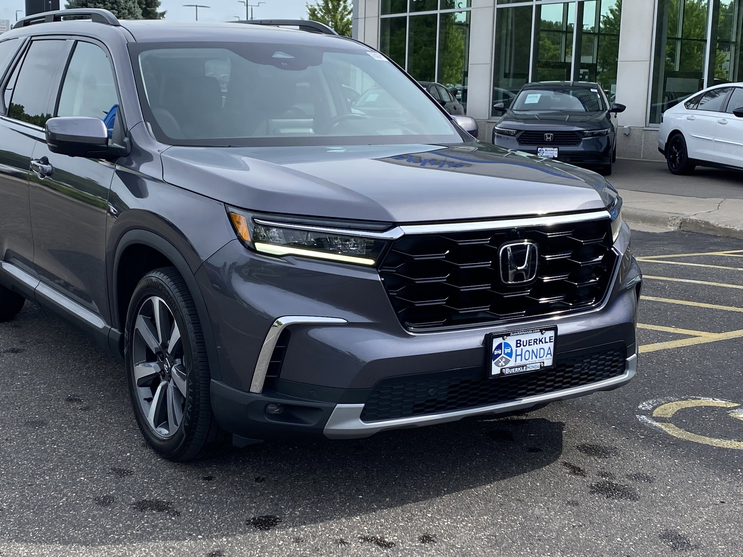 Certified 2023 Honda Pilot Elite with VIN 5FNYG1H87PB015833 for sale in Saint Paul, Minnesota