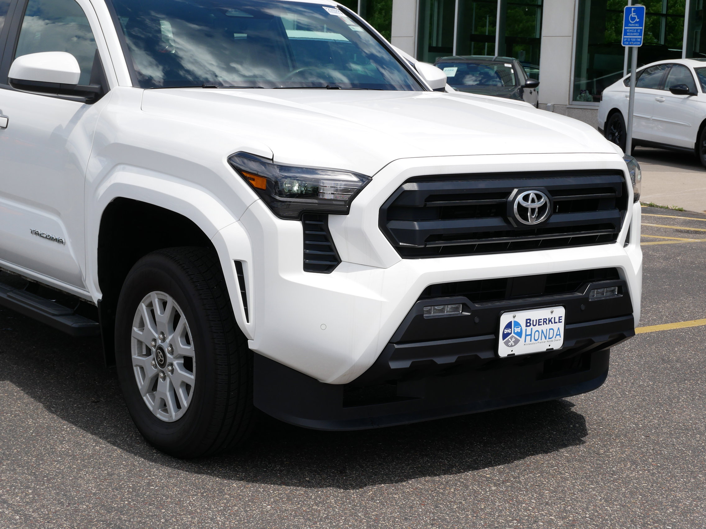 Used 2024 Toyota Tacoma SR5 with VIN 3TMLB5JN4RM010765 for sale in Saint Paul, Minnesota