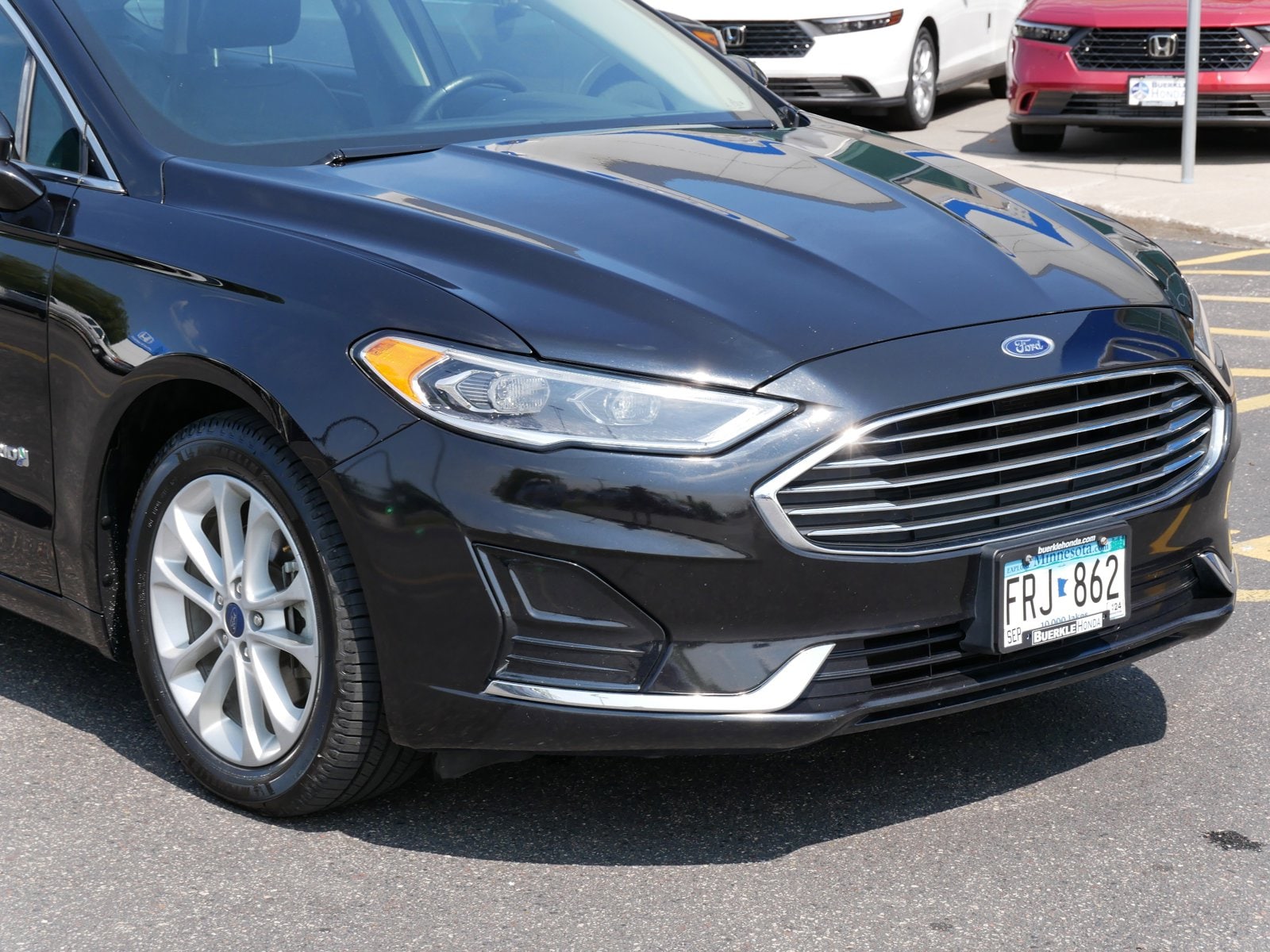 Used 2019 Ford Fusion Hybrid SEL with VIN 3FA6P0MU4KR123036 for sale in Saint Paul, MN