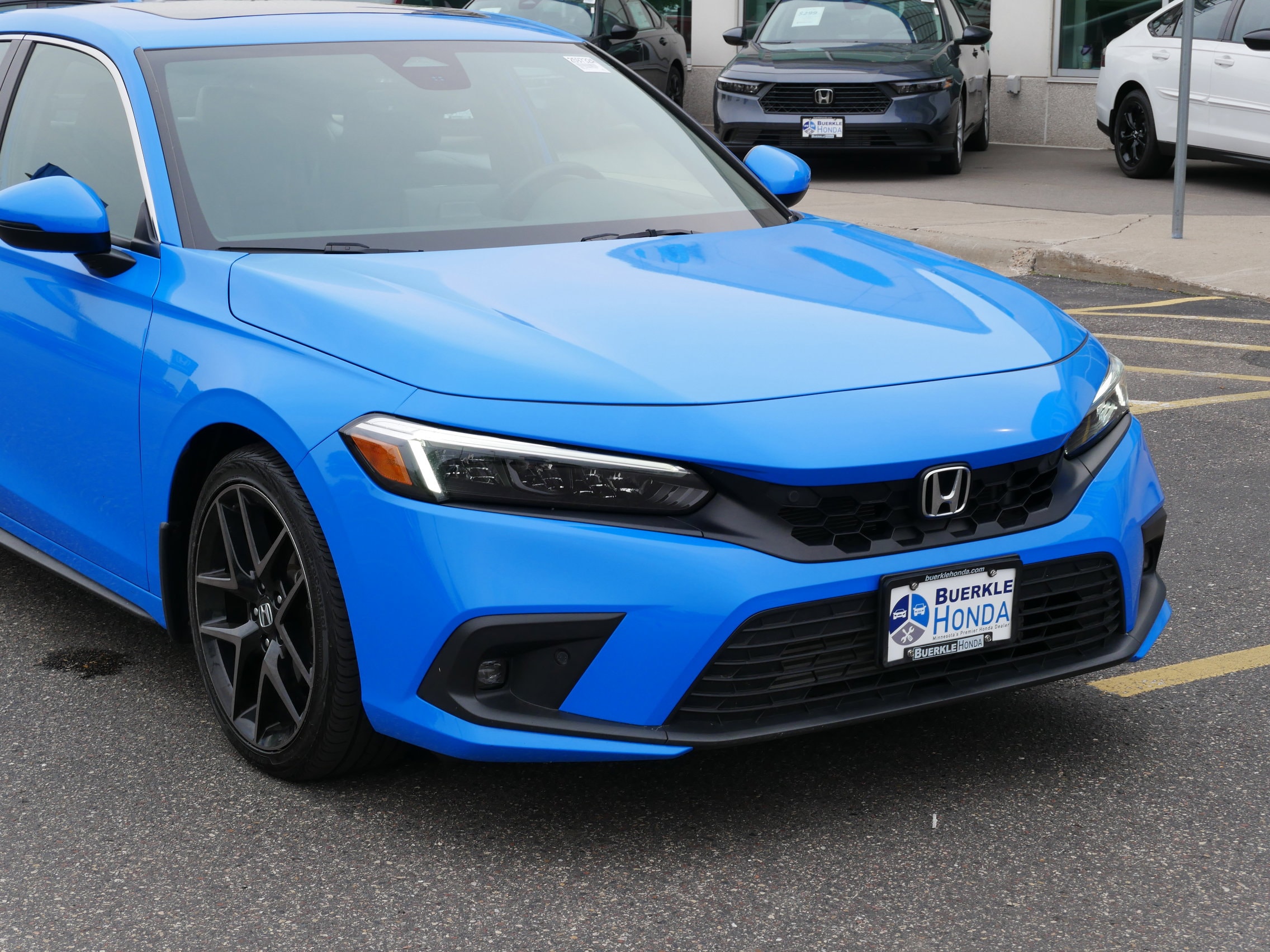 Certified 2022 Honda Civic Hatchback Sport Touring with VIN 19XFL1H82NE017415 for sale in Saint Paul, Minnesota