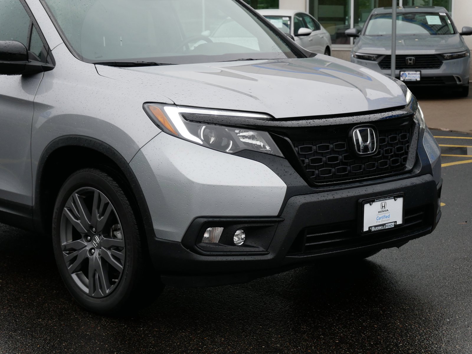 Certified 2021 Honda Passport EX-L with VIN 5FNYF8H51MB029207 for sale in Saint Paul, MN