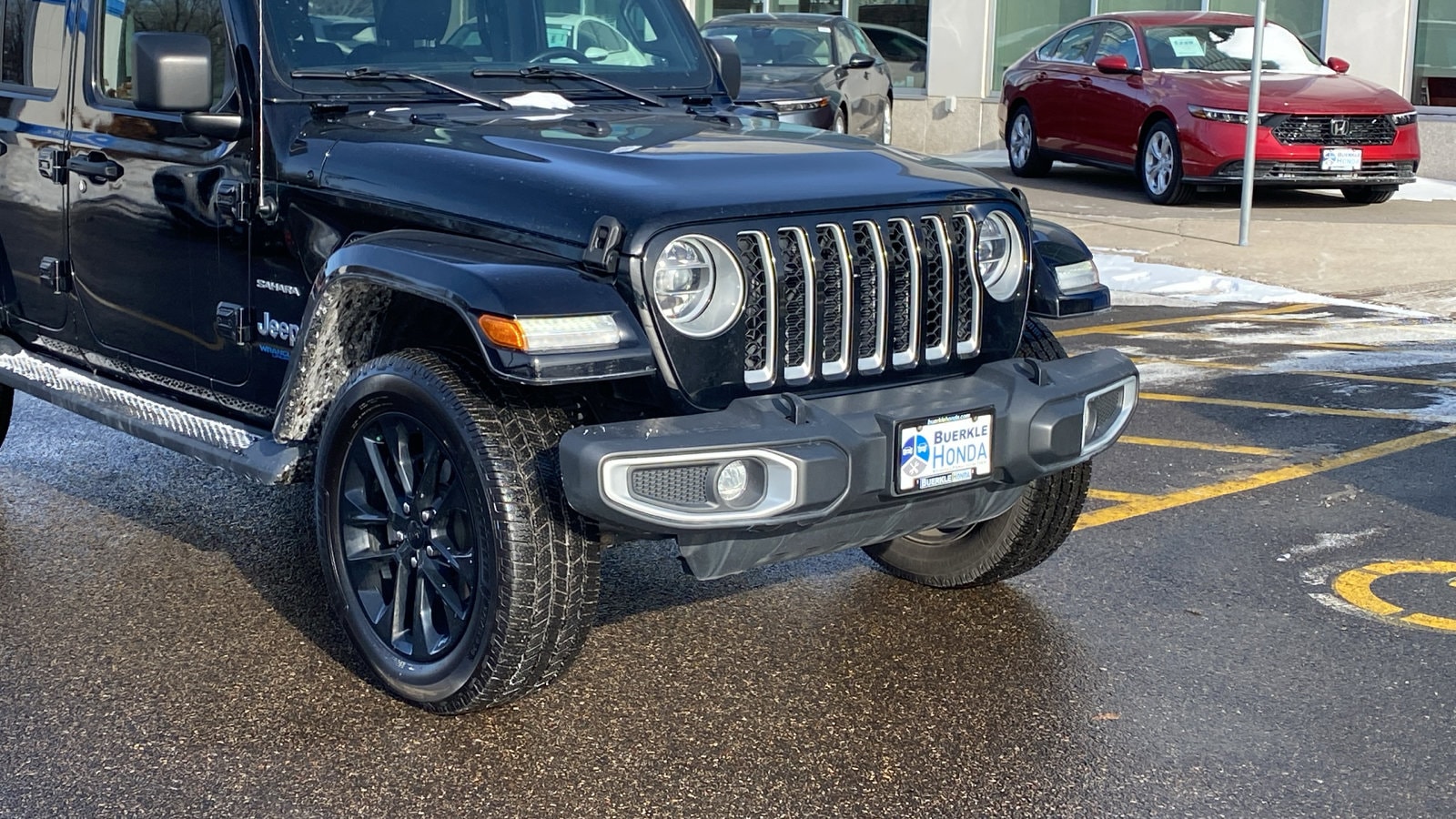 Used 2021 Jeep Wrangler Unlimited Sahara 4XE with VIN 1C4JJXP60MW698519 for sale in Saint Paul, Minnesota