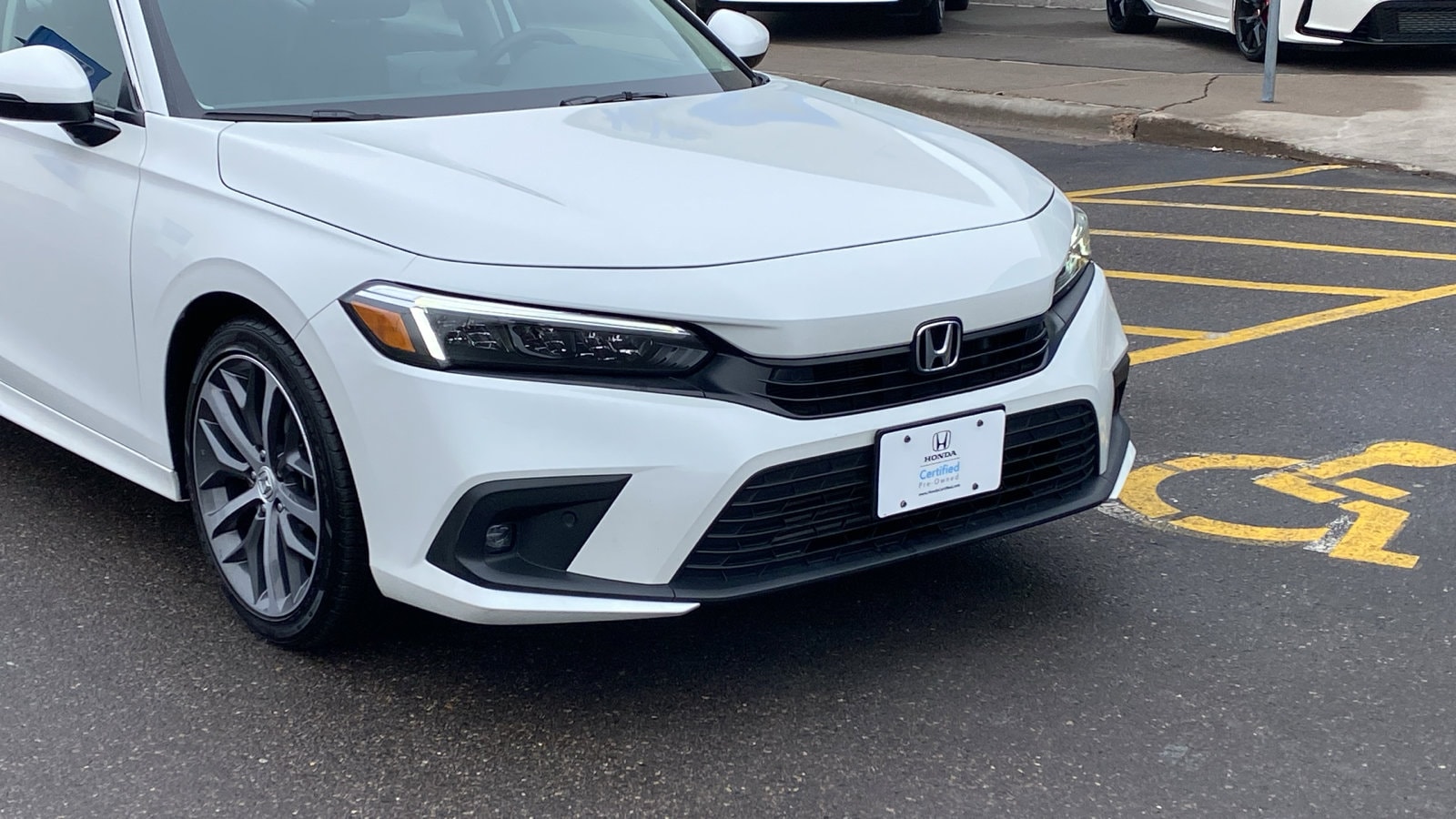 Certified 2023 Honda Civic Touring with VIN 2HGFE1F9XPH324233 for sale in Saint Paul, Minnesota