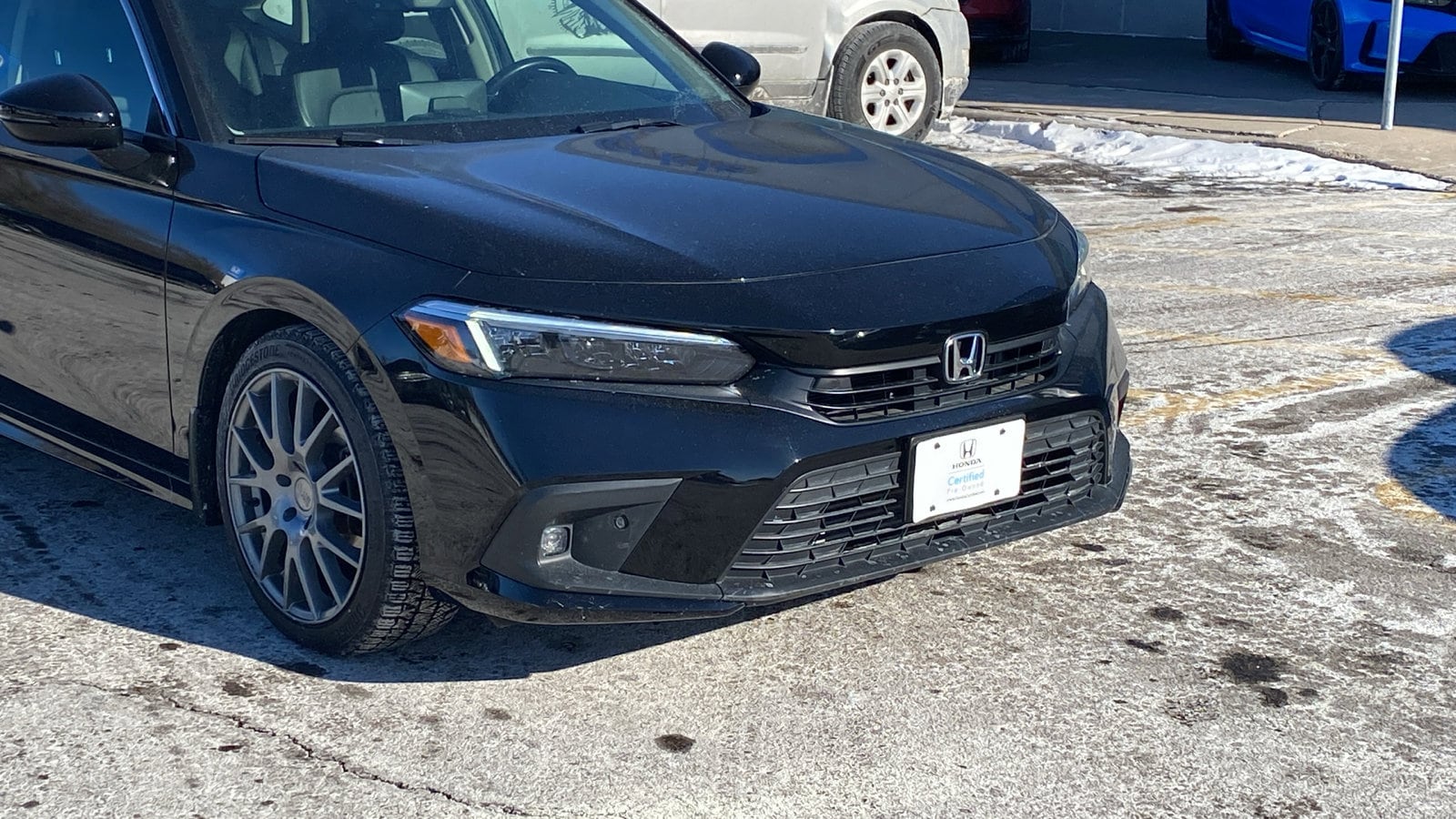 Certified 2022 Honda Civic Touring with VIN 2HGFE1F97NH304857 for sale in Saint Paul, Minnesota